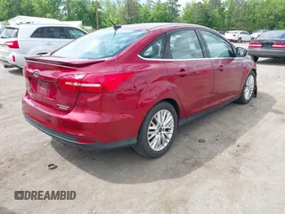 2016 Ford Focus Titanium with VIN 1FADP3J22GL314021, listed as a IAAI auction lot 42212462 with 142,370 mi miles and . Bid and sale history available at DreamBid. Image 4.