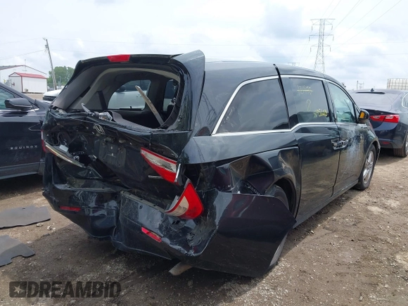 2012 Honda Odyssey Touring with VIN 5FNRL5H91CB121950, listed as a IAAI auction lot 42456620 with 200,831 mi miles and . Bid and sale history available at DreamBid. Image 6.