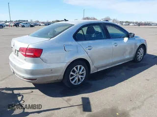 2015 Volkswagen Jetta Sedan 1.8T SE with VIN 3VWD17AJXFM324283, listed as a IAAI auction lot 41769785 with 103,686 mi miles. Bid and sale history available at carsss.com. Image 4.