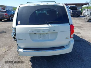 2018 Dodge Grand Caravan SXT with VIN 2C4RDGCG1JR326457, listed as a IAAI auction lot 42047301 with 84,518 mi miles and . Bid and sale history available at DreamBid. Image 16.