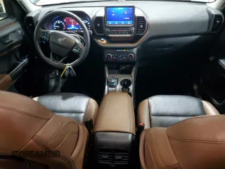 2023 Ford Bronco Sport Badlands z VIN 3FMCR9D91PRE01918, wystawiony jako Copart lot #52120145 z przebiegiem 8 415 mil mil oraz Szkoda całkowita • Salvage title. Historia ofert i sprzedaży dostępna na DreamBid. Obrazek 8.