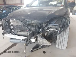 2014 Audi Q7 Premium Plus z VIN WA1LGAFE1ED014792, wystawiony jako IAAI lot #39705499 z przebiegiem 128 659 mil mil oraz . Historia ofert i sprzedaży dostępna na DreamBid. Obrazek 6.