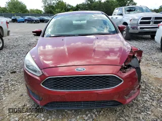 2016 Ford Focus SE z VIN 1FADP3F22GL355192, wystawiony jako Copart lot #56614225 z przebiegiem 56 214 mil mil oraz Szkoda całkowita • Salvage title. Historia ofert i sprzedaży dostępna na DreamBid. Obrazek 5.