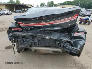 2015 Lincoln MKZ с VIN 3LN6L2JK3FR607012, выставлен на аукционе Copart как лот 60605655 с пробегом 87 347 миль миль и Списание • Salvage title. История ставок и продаж доступна на DreamBid. Изображение 6.