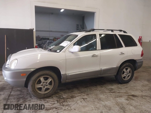 2004 Hyundai Santa Fe GLS with VIN KM8SC13E44U797943, listed as a IAAI auction lot 41731356 with 184,139 mi miles. Bid and sale history available at carsss.com. Image 14.