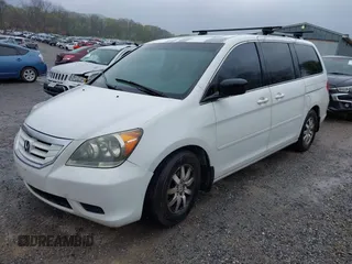 2010 Honda Odyssey EX-L with VIN 5FNRL3H65AB068497, listed as a IAAI auction lot 42013925 with 206,668 mi miles. Bid and sale history available at carsss.com. Image 6.