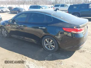 2016 Kia Optima LX Turbo with VIN 5XXGT4L18GG029739, listed as a IAAI auction lot 41496052 with 122,181 mi miles. Bid and sale history available at carsss.com. Image 3.