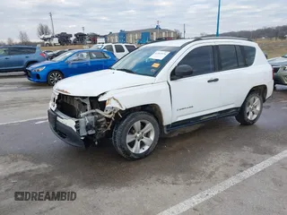 2016 Jeep Compass Sport with VIN 1C4NJDBB5GD804581, listed as a IAAI auction lot 41502976 with 196,351 mi miles and . Bid and sale history available at carsss.com. Image 21.