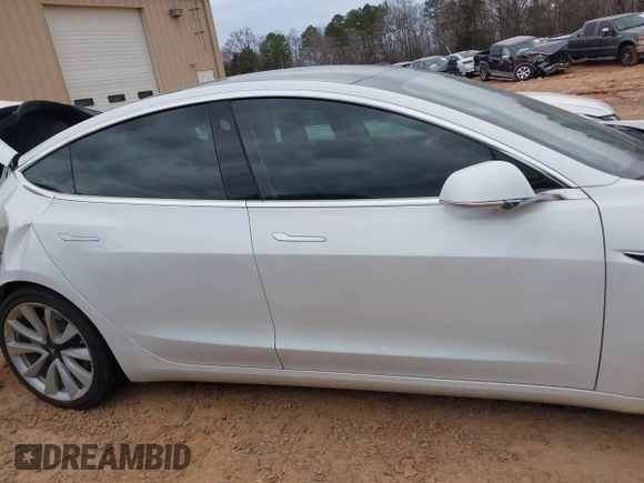 2020 Tesla Model 3 Standard Range Plus with VIN 5YJ3E1EA1LF738062, listed as a IAAI auction lot 41747581 with 41,897 mi miles. Bid and sale history available at carsss.com. Image 12.