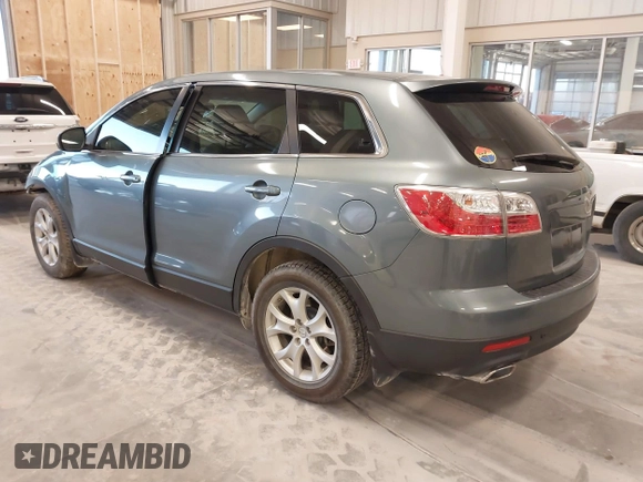 2011 Mazda CX-9 Touring with VIN JM3TB2CA2B0332314, listed as a IAAI auction lot 41077372 with 138,537 mi miles and . Bid and sale history available at DreamBid. Image 3.