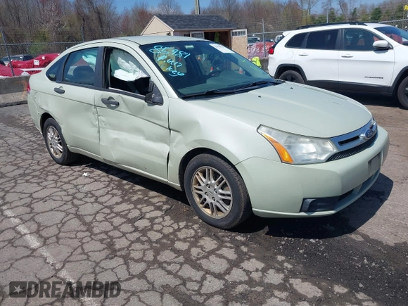 2011 Ford Focus SE with VIN 1FAHP3FN5BW182268, listed as a IAAI auction lot 42059027 with 119,368 mi miles. Bid and sale history available at carsss.com. Image 1.