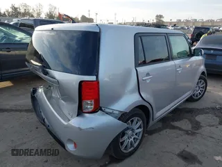 2013 Scion xB with VIN JTLZE4FE2DJ047490, listed as a IAAI auction lot 41812925 with 154,191 mi miles. Bid and sale history available at carsss.com. Image 4.