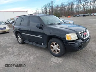2006 GMC Envoy SLE with VIN 1GKDT13S962287240, listed as a IAAI auction lot 41714392 with 1 mi miles. Bid and sale history available at carsss.com. Image 1.