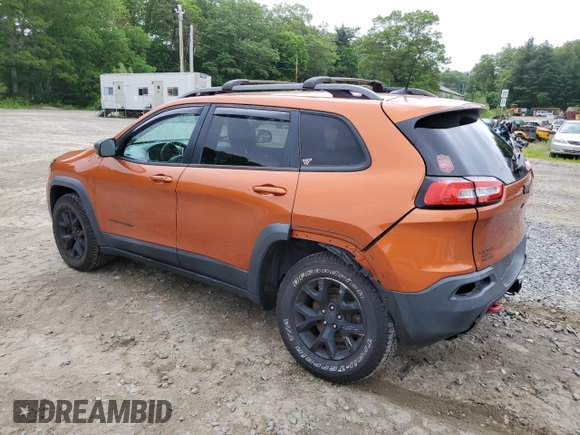 2016 Jeep Cherokee Trailhawk with VIN 1C4PJMBS2GW255368, listed as a Copart auction lot 59010305 with 105,667 mi miles and Salvage title. Bid and sale history available at DreamBid. Image 2.