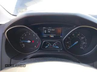 2016 Ford Focus SE with VIN 1FADP3F27GL257596, listed as a IAAI auction lot 41619509 with 75,606 mi miles. Bid and sale history available at carsss.com. Image 7.