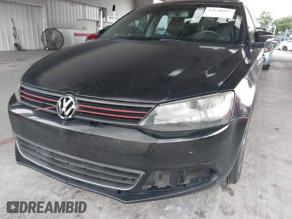 2013 Volkswagen Jetta SE z VIN 3VWDP7AJ1DM405572, wystawiony jako IAAI lot #42630897 z przebiegiem 257 925 mil mil oraz . Historia ofert i sprzedaży dostępna na DreamBid. Obrazek 6.