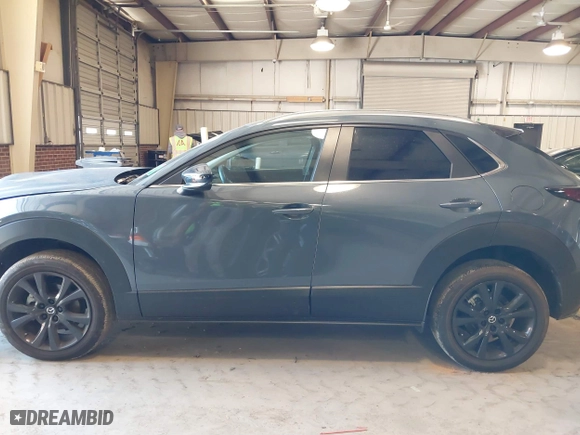 2022 Mazda CX-30 2.5 S Preferred Package with VIN 3MVDMBCL4NM434657, listed as a IAAI auction lot 41431144 with 22,234 mi miles. Bid and sale history available at carsss.com. Image 15.