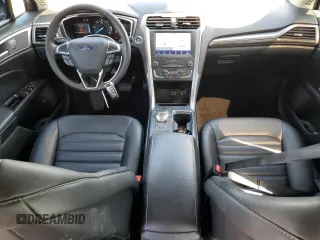 2020 Ford Fusion Hybrid SEL with VIN 3FA6P0MU4LR139285, listed as a Copart auction lot 71680004 with 102,344 mi miles and Salvage Title. Bid and sale history available at carsss.com. Image 6.