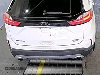 2019 Ford Edge SEL with VIN 2FMPK3J9XKBC37759, listed as a IAAI auction lot 42666643 with 103,812 mi miles and . Bid and sale history available at DreamBid. Image 25.