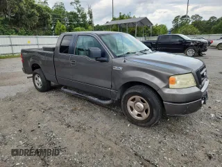 2005 Ford F-150 STX with VIN 1FTRX12W55FB32573, listed as a Copart auction lot 59602715 with 238,701 mi miles and Salvage title. Bid and sale history available at DreamBid. Image 4.
