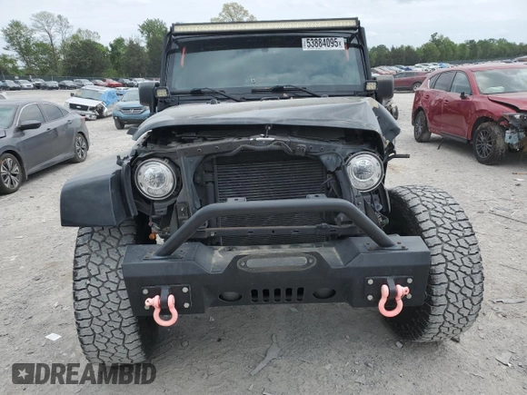 2017 Jeep Wrangler Sahara z VIN 1C4AJWBG8HL547512, wystawiony jako Copart lot #53884095 z przebiegiem 107 260 mil mil oraz Szkoda całkowita • Salvage title. Historia ofert i sprzedaży dostępna na DreamBid. Obrazek 5.