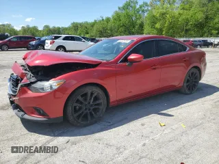 2014 Mazda 6 i Grand Touring с VIN JM1GJ1W64E1143712, выставлен на аукционе Copart как лот 56228235 с пробегом 126 286 миль миль и Списание • Salvage title. История ставок и продаж доступна на DreamBid. Изображение 1.
