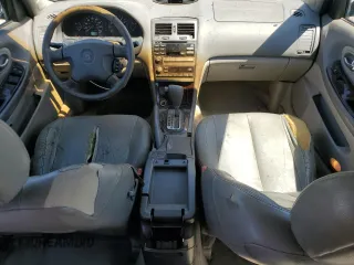 2000 Nissan Maxima GXE z VIN JN1CA31D6YT762114, wystawiony jako Copart lot #57908775 z przebiegiem 207 805 mil mil oraz Szkody całkowita. Historia ofert i sprzedaży dostępna na DreamBid. Obrazek 8.