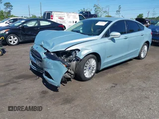 2014 Ford Fusion SE Hybrid with VIN 3FA6P0LU3ER373311, listed as a IAAI auction lot 42048513 with 155,935 mi miles. Bid and sale history available at carsss.com. Image 17.