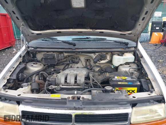 1992 Dodge Caravan Grand SE z VIN 1B4GH44R5NX258694, wystawiony jako IAAI lot #42197603 z przebiegiem 152 591 mil mil oraz . Historia ofert i sprzedaży dostępna na DreamBid. Obrazek 10.