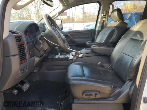 2014 Nissan Titan S with VIN 1N6AA0EC7EN503648, listed as a Copart auction lot 86517824 with 82,556 mi miles and Salvage Title. Bid and sale history available at DreamBid. Image 7.