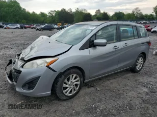 2012 Mazda 5 Sport z VIN JM1CW2BLXC0125493, wystawiony jako Copart lot #54611855 z przebiegiem 117 364 mil mil oraz Czysty tytuł • Clean title. Historia ofert i sprzedaży dostępna na DreamBid. Obrazek 1.