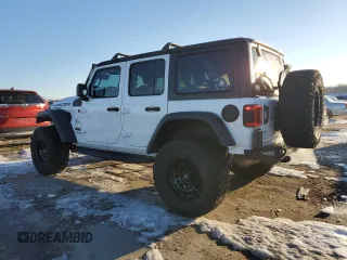 2018 Jeep Wrangler Unlimited Rubicon with VIN 1C4HJXFG8JW104425, listed as a Copart auction lot 87545965 with 62,988 mi miles and Salvage title. Bid and sale history available at DreamBid. Image 2.