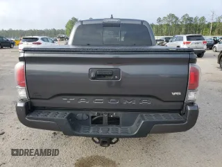 2021 Toyota Tacoma SR z VIN 3TMCZ5ANXMM433788, wystawiony jako Copart lot #51614785 z przebiegiem 58 157 mil mil oraz Czysty tytuł • Clean title. Historia ofert i sprzedaży dostępna na DreamBid. Obrazek 6.