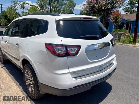 2017 Chevrolet Traverse LS with VIN 1GNKRFED3HJ341144, listed as a Copart auction lot 65771795 with 142,525 mi miles and Clean title. Bid and sale history available at DreamBid. Image 3.