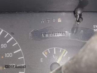 1997 Pontiac Bonneville SE z VIN 1G2HX52KXVH250272, wystawiony jako IAAI lot #41644041 z przebiegiem 160 791 mil mil oraz . Historia ofert i sprzedaży dostępna na DreamBid. Obrazek 16.