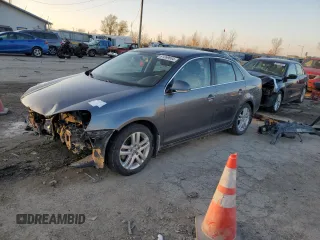 2009 Volkswagen Jetta z VIN 3VWAL71K09M133238, wystawiony jako Copart lot #81069654 z przebiegiem 153 617 mil mil oraz Szkoda całkowita • Salvage title. Historia ofert i sprzedaży dostępna na DreamBid. Obrazek 1.