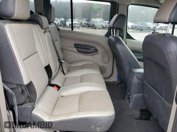 2015 Ford Transit Connect XLT z VIN NM0GE9F7XF1195100, wystawiony jako Copart lot #86870364 z przebiegiem 54 491 mil mil oraz Szkoda całkowita • Salvage title. Historia ofert i sprzedaży dostępna na DreamBid. Obrazek 11.