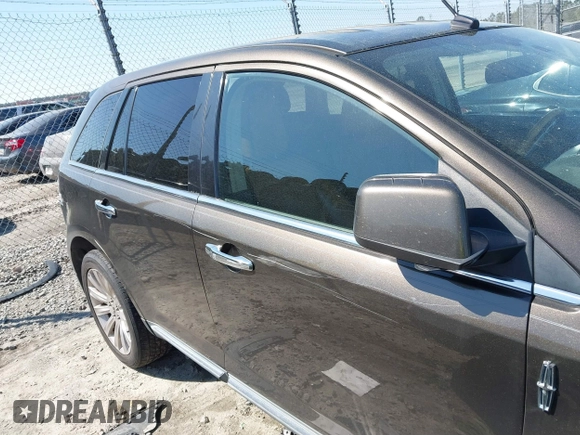 2011 Lincoln MKX with VIN 2LMDJ6JK1BBJ11840, listed as a IAAI auction lot 41769107 with 202,313 mi miles. Bid and sale history available at carsss.com. Image 13.