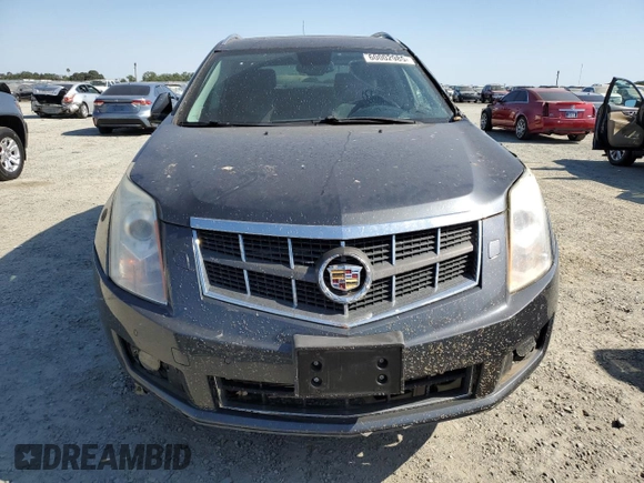 2012 Cadillac SRX Performance Collection z VIN 3GYFNBE32CS596228, wystawiony jako Copart lot #60002985 z przebiegiem 71 738 mil mil oraz Szkoda całkowita • Salvage title. Historia ofert i sprzedaży dostępna na DreamBid. Obrazek 5.