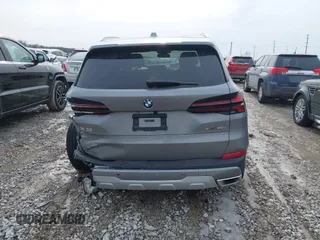 2025 BMW X5 xDrive40i with VIN 5UX23EU02S9X44610, listed as a IAAI auction lot 41469794 with 1,964 mi miles. Bid and sale history available at carsss.com. Image 17.
