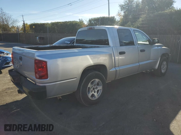 2007 Dodge Dakota SLT with VIN 1D7HE48K47S103248, listed as a Copart auction lot 82744094 with 126,126 mi miles and Salvage Title. Bid and sale history available at DreamBid. Image 3.