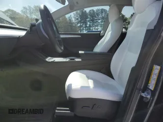 2023 Tesla Model Y Long Range z VIN 7SAYGAEE9PF662103, wystawiony jako Copart lot #51332105 z przebiegiem 35 294 mil mil oraz Szkody całkowita. Historia ofert i sprzedaży dostępna na DreamBid. Obrazek 7.