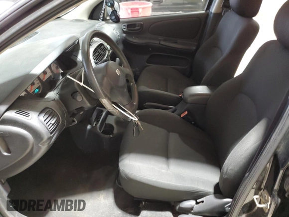 2004 Dodge Neon SXT with VIN 1B3ES56CX4D596703, listed as a Copart auction lot 51340445 with 184,207 mi miles and Salvage Title. Bid and sale history available at carsss.com. Image 7.