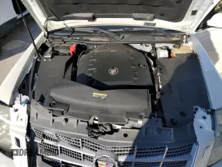 2010 Cadillac STS AWD z VIN 1G6DU6EV0A0101850, wystawiony jako Copart lot #83113264 z przebiegiem 103 491 mil mil oraz Szkoda całkowita • Salvage title. Historia ofert i sprzedaży dostępna na DreamBid. Obrazek 11.