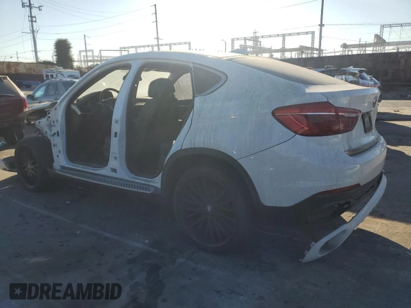 2016 BMW X6 sDrive35i with VIN 5UXKU0C56G0F92990, listed as a Copart auction lot 77191074 with 194,077 mi miles and Salvage Title. Bid and sale history available at carsss.com. Image 2.