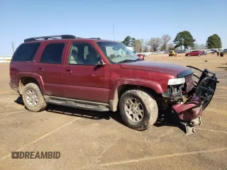 2003 Chevrolet Tahoe LS with VIN 1GNEK13Z93R256421, listed as a Copart auction lot 49001975 with 318,219 mi miles and Salvage Title. Bid and sale history available at DreamBid. Image 4.
