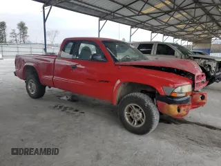 1999 Dodge Dakota SLT with VIN 1B7GG22Y5XS276472, listed as a Copart auction lot 85417774 with 264,833 mi miles and Salvage Title. Bid and sale history available at DreamBid. Image 4.