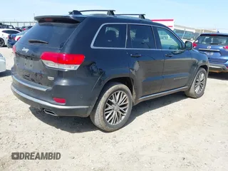 2018 Jeep Grand Cherokee Summit with VIN 1C4RJEJG2JC392847, listed as a IAAI auction lot 41751452 with 136,793 mi miles and . Bid and sale history available at DreamBid. Image 4.