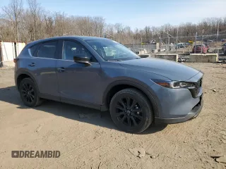 2024 Mazda CX-5 2.5 S Carbon Edition with VIN JM3KFBCL7R0409464, listed as a Copart auction lot 47700965 with 7,844 mi miles and Salvage Title. Bid and sale history available at carsss.com. Image 4.