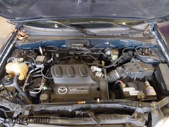2003 Mazda Tribute LX with VIN 4F2YZ94193KM56345, listed as a IAAI auction lot 41200769 with 141,728 mi miles and . Bid and sale history available at DreamBid. Image 10.